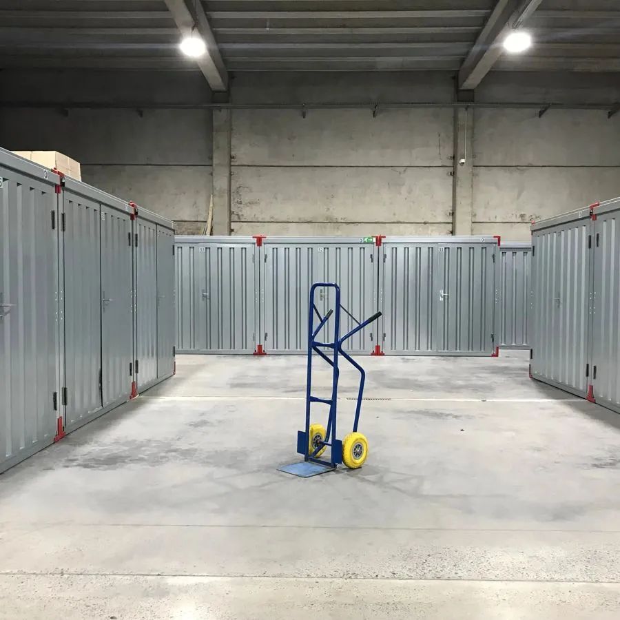 A row of self storage units with a trolley